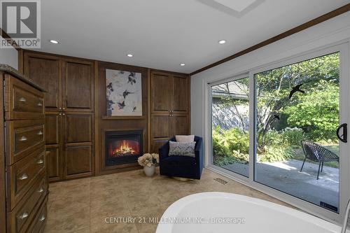 Private deck off ensuite bathroom - 5136 Fifth Line, Erin, ON - Indoor With Fireplace