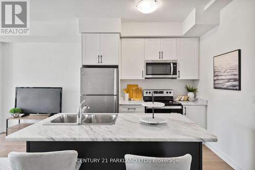 1602 - 160 Densmore Road, Cobourg, ON - Indoor Photo Showing Kitchen With Double Sink With Upgraded Kitchen