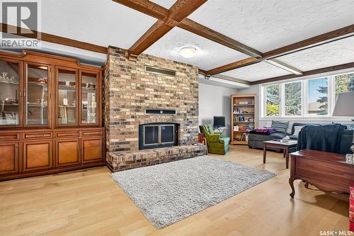 133 Wood Lily Drive, Moose Jaw, SK - Indoor Photo Showing Living Room With Fireplace