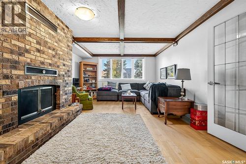 133 Wood Lily Drive, Moose Jaw, SK - Indoor Photo Showing Living Room With Fireplace