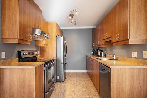 Cuisine - 8-8645 Place Du Charpentier, Mirabel, QC - Indoor Photo Showing Kitchen