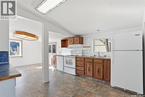 450 Charles Street, Asquith, SK - Indoor Photo Showing Kitchen With Double Sink