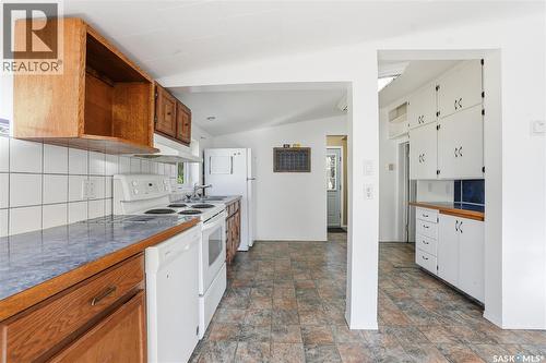450 Charles Street, Asquith, SK - Indoor Photo Showing Kitchen With Double Sink