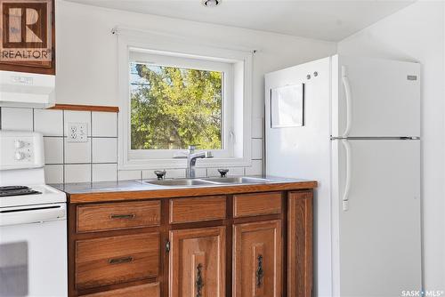 450 Charles Street, Asquith, SK - Indoor Photo Showing Kitchen With Double Sink