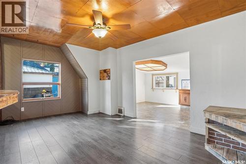 450 Charles Street, Asquith, SK - Indoor Photo Showing Other Room With Fireplace