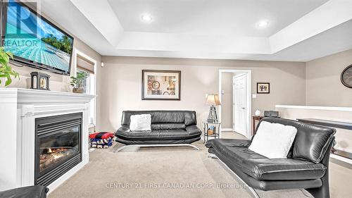 62 Elliott Trail, Thames Centre (Thorndale), ON - Indoor Photo Showing Living Room With Fireplace