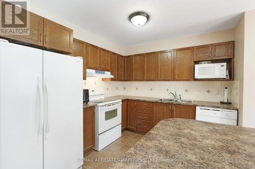 76 Indigo Street, Ottawa, ON - Indoor Photo Showing Kitchen With Double Sink