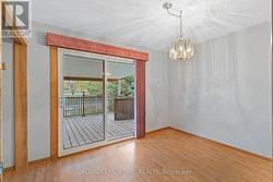 Den with access to back deck - 