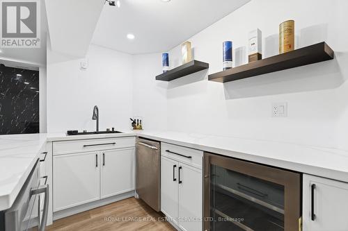 Beverage fridge & dishwasher - 2240 Pine Glen Road, Oakville, ON - Indoor Photo Showing Kitchen