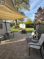 Party patio behind garage - 