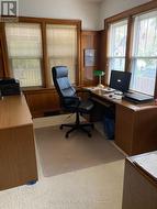 Main floor office with wooden accents - 