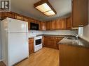 102 1St Street, Vernon, BC  - Indoor Photo Showing Kitchen With Double Sink 