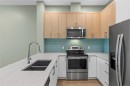 501-6540 Metral Dr, Nanaimo, BC  - Indoor Photo Showing Kitchen With Double Sink With Upgraded Kitchen 