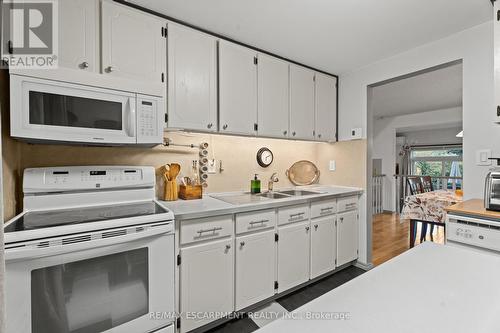 7 - 1967 Main Street W, Hamilton, ON - Indoor Photo Showing Kitchen With Double Sink