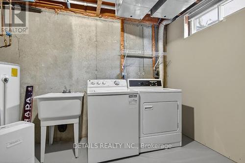 Laundry rm in basement level w laundry sink. - 128 - 3112 Olympic Way, Ottawa, ON - Indoor Photo Showing Laundry Room