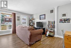 Bright LVG RM w/ quality laminate floors. - 