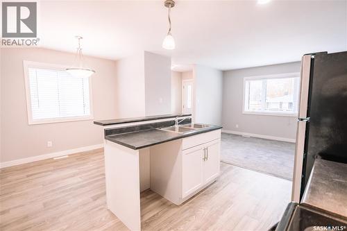 455 Toronto Street, Regina, SK - Indoor Photo Showing Kitchen With Double Sink