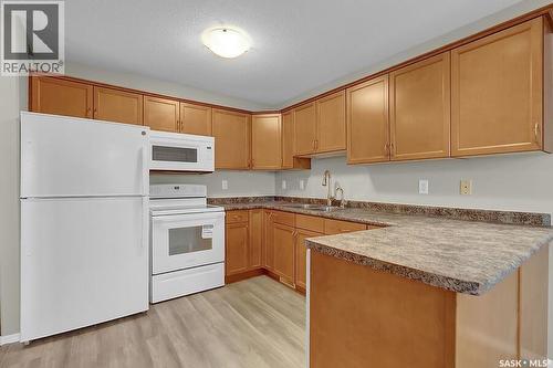 221 South Front Street, Pense, SK - Indoor Photo Showing Kitchen With Double Sink