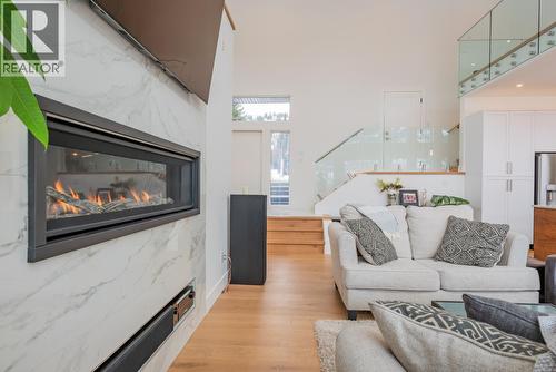 3429 8Th Avenue, Castlegar, BC - Indoor Photo Showing Living Room With Fireplace