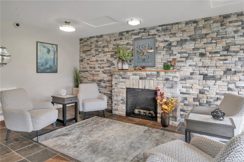 304-2676 Island Hwy South, Campbell River, BC - Indoor Photo Showing Living Room With Fireplace