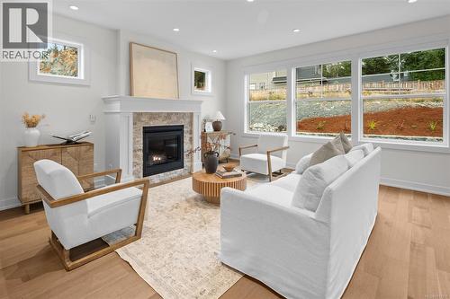 678 Madrona Pl, Langford, BC - Indoor Photo Showing Living Room With Fireplace