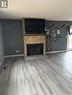 511 6Th Avenue, Cudworth, SK  - Indoor Photo Showing Living Room With Fireplace 
