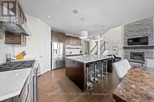 308 Equine Way, Ottawa, ON - Indoor Photo Showing Kitchen With Fireplace With Upgraded Kitchen