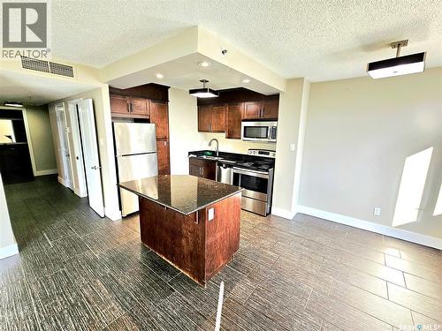 607 320 5Th Avenue N, Saskatoon, SK - Indoor Photo Showing Kitchen