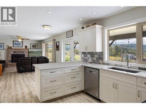 5432 Rochdell Road, Coldstream, BC - Indoor Photo Showing Kitchen With Double Sink