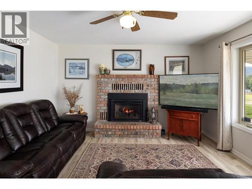 5432 Rochdell Road, Coldstream, BC - Indoor Photo Showing Living Room With Fireplace