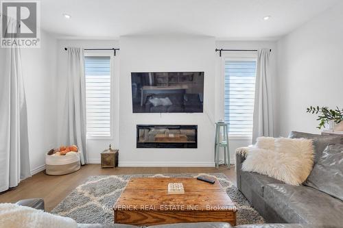 21 Chamberlain Avenue, Ingersoll (Ingersoll - South), ON - Indoor Photo Showing Living Room With Fireplace