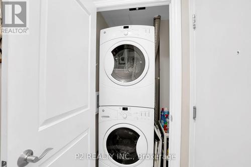 1002 - 16 Brookers Lane E, Toronto, ON - Indoor Photo Showing Laundry Room