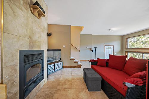 Family room - 3020 Ch. Du Lac-Du-Raquetteur, Mont-Blanc, QC - Indoor Photo Showing Living Room With Fireplace