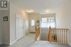 Access to garage and basement area off foyer - 