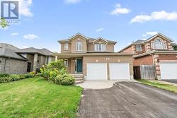 Double car garage and extra driveway parking space - 