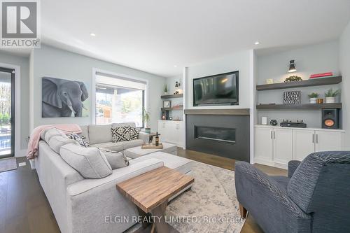 107 Optimist Drive, Southwold, ON - Indoor Photo Showing Living Room With Fireplace