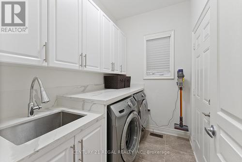 Main Laundry - 43 Valleyscape Trail, Caledon, ON - Indoor Photo Showing Laundry Room