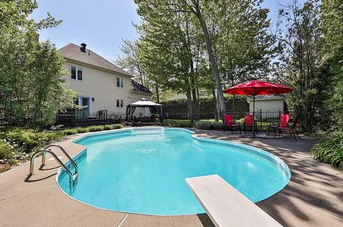Backyard - 6 Rue Des Doublons, Blainville, QC - Outdoor With In Ground Pool With Backyard