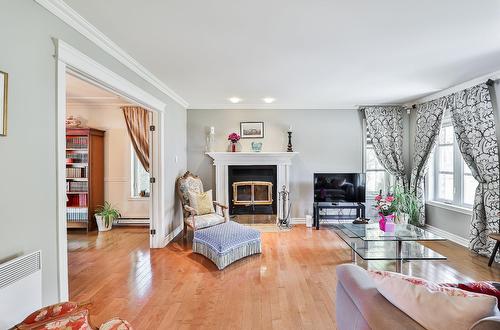 Living room - 6 Rue Des Doublons, Blainville, QC - Indoor Photo Showing Living Room With Fireplace