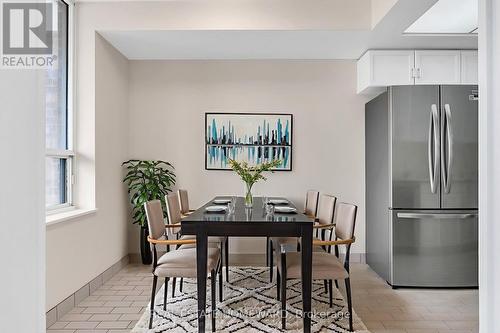 Virtual Staged Breakfast Area - 1006 - 215 Wynford Drive, Toronto, ON - Indoor Photo Showing Dining Room