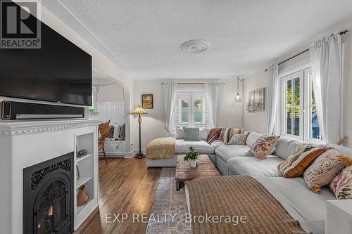 24 Robinson Street S, Grimsby, ON - Indoor Photo Showing Living Room With Fireplace