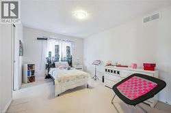 Bedroom with carpet flooring and a textured ceiling - 