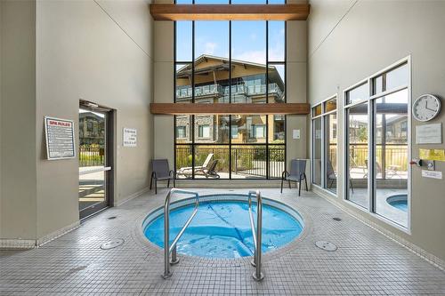 111-600 Sarsons Road, Kelowna, BC - Indoor Photo Showing Other Room With In Ground Pool