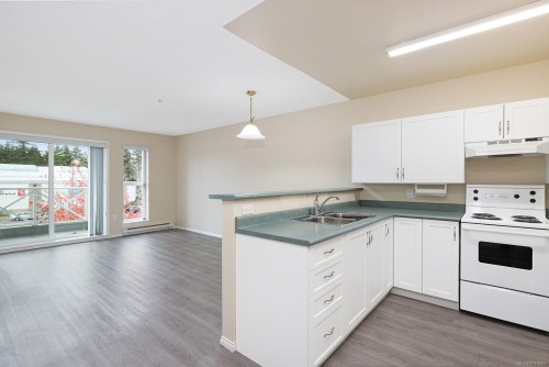 403-1683 Balmoral Ave, Comox, BC - Indoor Photo Showing Kitchen With Double Sink