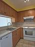 Kitchen - 307-320 Av. Victoria, Saint-Lambert, QC  - Indoor Photo Showing Kitchen With Double Sink 