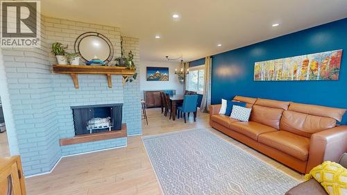 10204 Turner Crescent, Hudsons Hope, BC - Indoor Photo Showing Other Room With Fireplace