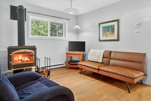 Boudoir - 296 Ch. Bréard, Mont-Tremblant, QC - Indoor Photo Showing Living Room With Fireplace