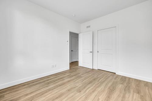 Chambre à coucher principale - 4-41 Rue Bellevue, Saint-Anselme, QC - Indoor Photo Showing Other Room