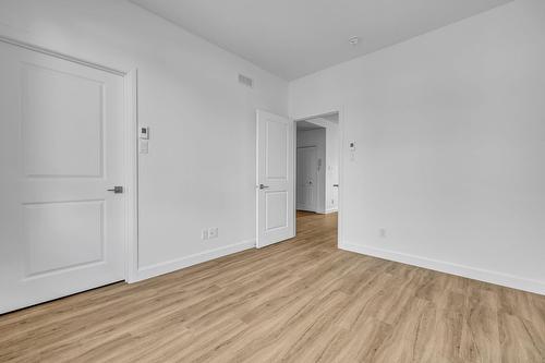 Chambre à coucher principale - 3-41 Rue Bellevue, Saint-Anselme, QC - Indoor Photo Showing Other Room