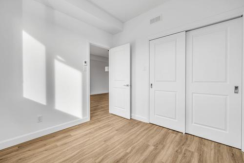 Chambre à coucher - 3-41 Rue Bellevue, Saint-Anselme, QC - Indoor Photo Showing Other Room